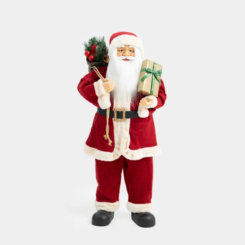 Decorative item, 90 cm, soft, Santa in red with bag and gift, Magic time